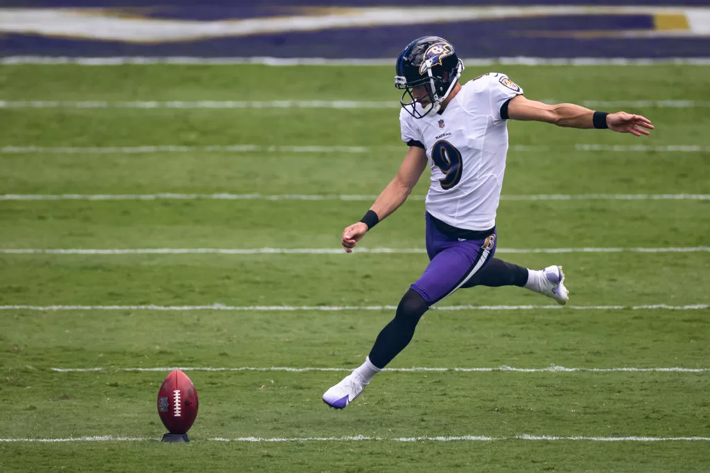 BALTIMORE, MD - SEPTEMBER 13: Justin Tucker #9 of the Baltimore Ravens takes the opening kick-off against the Cleveland Browns at M&T Bank Stadium on September 13, 2020 in Baltimore, Maryland