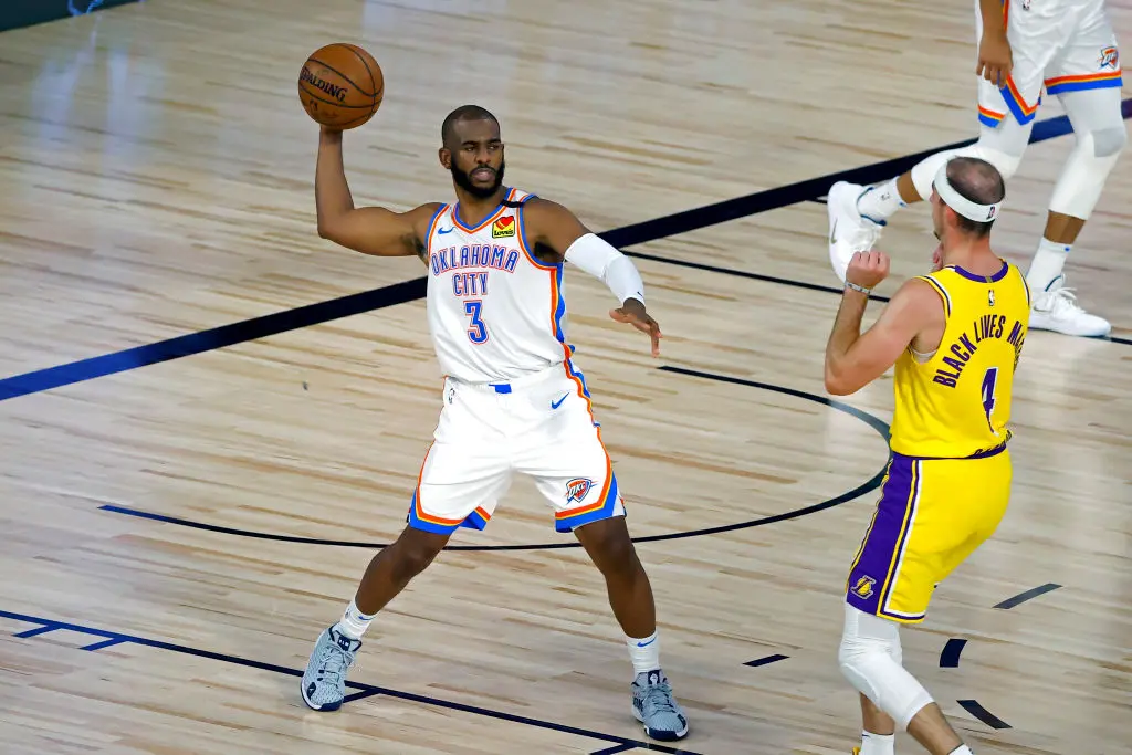 LAKE BUENA VISTA, FLORIDA - AUGUST 05: Chris Paul #3 of the Oklahoma City Thunder handles the ball on offense against the Los Angeles Lakers during the first quarter at HP Field House at ESPN Wide World Of Sports Complex on August 05, 2020 in Lake Buena Vista, Florida