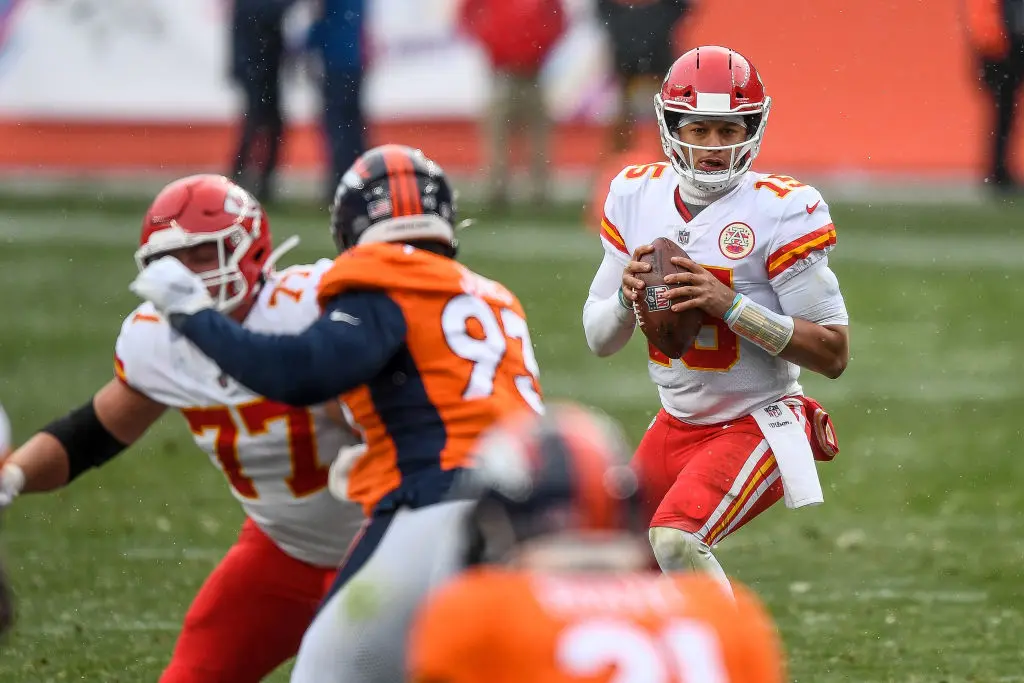 DENVER, CO - OCTOBER 25: Patrick Mahomes #15 of the Kansas City Chiefs scans the field before passing against the Denver Broncos at Empower Field at Mile High on October 25, 2020 in Denver, Colorado