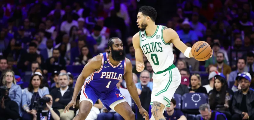 PHILADELPHIA, PENNSYLVANIA - APRIL 04: James Harden #1 of the Philadelphia 76ers guards Jayson Tatum #0 of the Boston Celtics during the second quarter at Wells Fargo Center on April 04, 2023 in Philadelphia, Pennsylvania