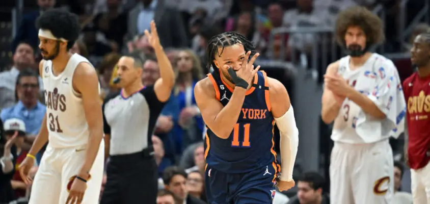 CLEVELAND, OHIO - APRIL 15: Jalen Brunson #11 of the New York Knicks celebrates after scoring during the fourth quarter of Game One of the Eastern Conference First Round Playoffs against the Cleveland Cavaliers at Rocket Mortgage Fieldhouse on April 15, 2023 in Cleveland, Ohio. The Knicks defeated the Cavaliers 101-97.