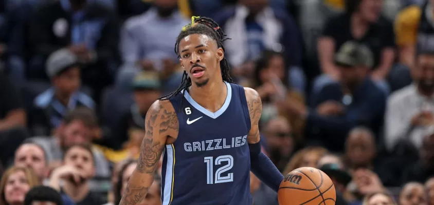 MEMPHIS, TENNESSEE - APRIL 16: Ja Morant #12 of the Memphis Grizzlies brings the ball up court during the game against the Los Angeles Lakers during Game One of the Western Conference First Round Playoffs at FedExForum on April 16, 2023 in Memphis, Tennessee.