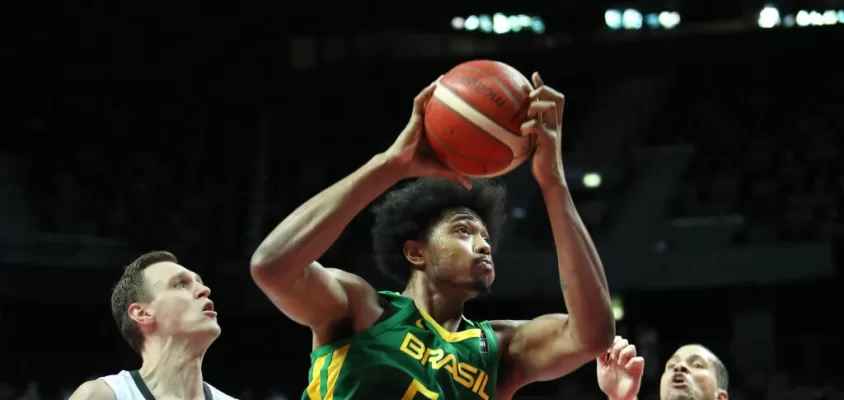 SPLIT, CROATIA - JULY 04: Bruno Caboclo of Brazil shoots during the 2020 FIBA Men's Olympic Qualifying Tournament final between Germany and Brazil at Spaladium Arena on July 4, 2021 in Split, Croatia.