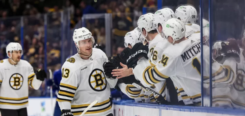 TAMPA, FL - NOVEMBER 20: Charlie Coyle #13 of the Boston Bruins celebrates a goal against the Tampa Bay Lightning during the third period at Amalie Arena on November 20, 2023 in Tampa, Florida