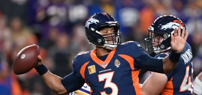 DENVER, COLORADO - NOVEMBER 19: Quarterback Russell Wilson #3 of the Denver Broncos throws a deep pass during the second quarter of the NFL game against the Minnesota Vikings at Empower Field At Mile High on November 19, 2023 in Denver, Colorado.