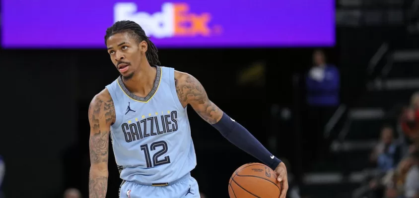 MEMPHIS, TENNESSEE - JANUARY 02: Ja Morant #12 of the Memphis Grizzlies handles the ball during the game against the San Antonio Spurs at FedExForum on January 02, 2024 in Memphis, Tennessee.