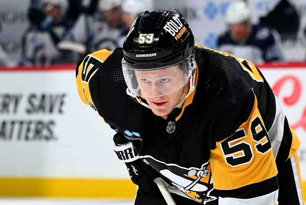 PITTSBURGH, PA - FEBRUARY 06: Jake Guentzel #59 of the Pittsburgh Penguins looks on against the Winnipeg Jets at PPG PAINTS Arena on February 6, 2024 in Pittsburgh, Pennsylvania