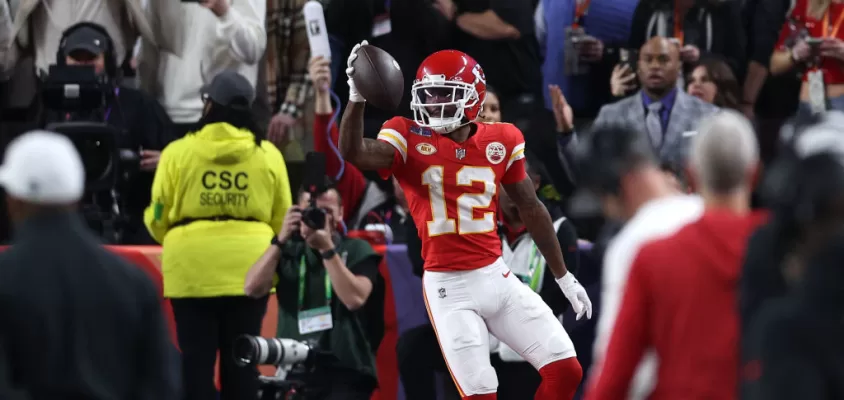 LAS VEGAS, NEVADA - FEBRUARY 11: Mecole Hardman Jr. #12 of the Kansas City Chiefs catches a pass for a touchdown to defeat the San Francisco 49ers 25-22 in overtime during Super Bowl LVIII at Allegiant Stadium on February 11, 2024 in Las Vegas, Nevada.