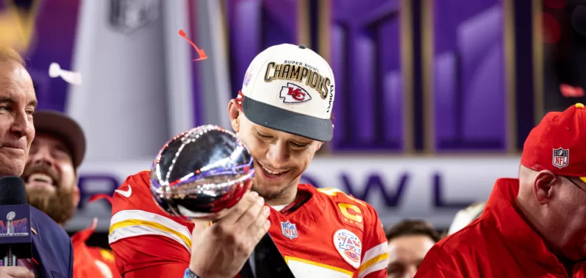 LAS VEGAS, NEVADA - FEBRUARY 11: Patrick Mahomes #15 of the Kansas City Chiefs celebrates with the Vince Lombardi Trophy following the NFL Super Bowl 58 football game between the San Francisco 49ers and the Kansas City Chiefs at Allegiant Stadium on February 11, 2024 in Las Vegas, Nevada.