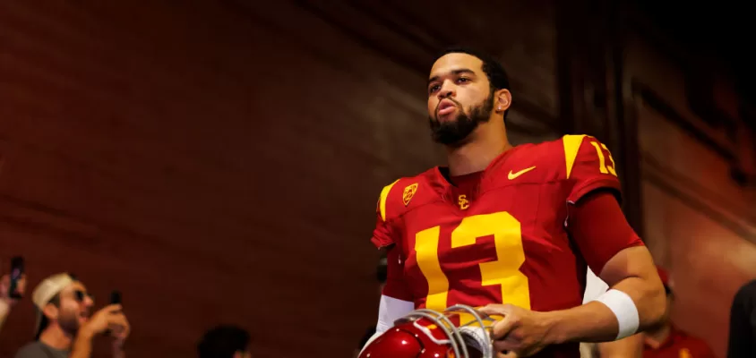 LOS ANGELES, CALIFORNIA - NOVEMBER 18: Caleb Williams #13 of the USC Trojans walks to the field for team entrances prior to a game against the UCLA Bruins at United Airlines Field at the Los Angeles Memorial Coliseum on November 18, 2023 in Los Angeles, California