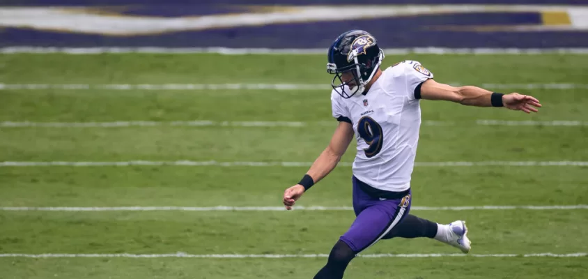 BALTIMORE, MD - SEPTEMBER 13: Justin Tucker #9 of the Baltimore Ravens takes the opening kick-off against the Cleveland Browns at M&T Bank Stadium on September 13, 2020 in Baltimore, Maryland