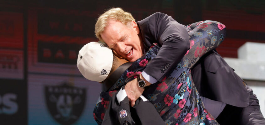 KANSAS CITY, MISSOURI - APRIL 27: (L-R) Tyree Wilson celebratewith NFL Commissioner Roger Goodell after being selected seventh overall by the Las Vegas Raiders during the first round of the 2023 NFL Draft at Union Station on April 27, 2023 in Kansas City, Missouri