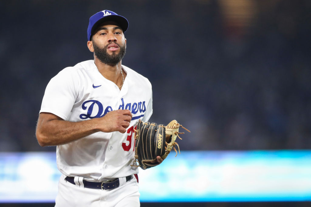 LOS ANGELES, CALIFORNIA - SEPTEMBER 22: Amed Rosario #31 of the Los Angeles Dodgers exits the field after the eighth inning against the San Francisco Giants at Dodger Stadium on September 22, 2023 in Los Angeles, California